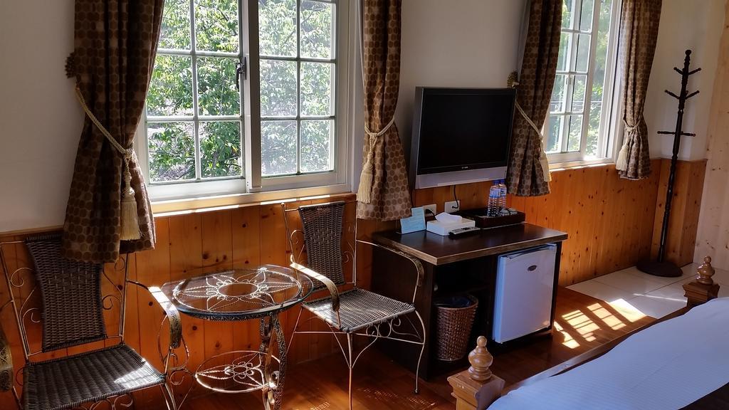 Qingjing Xiaozhu Apartman Zsenaj Szoba fotó