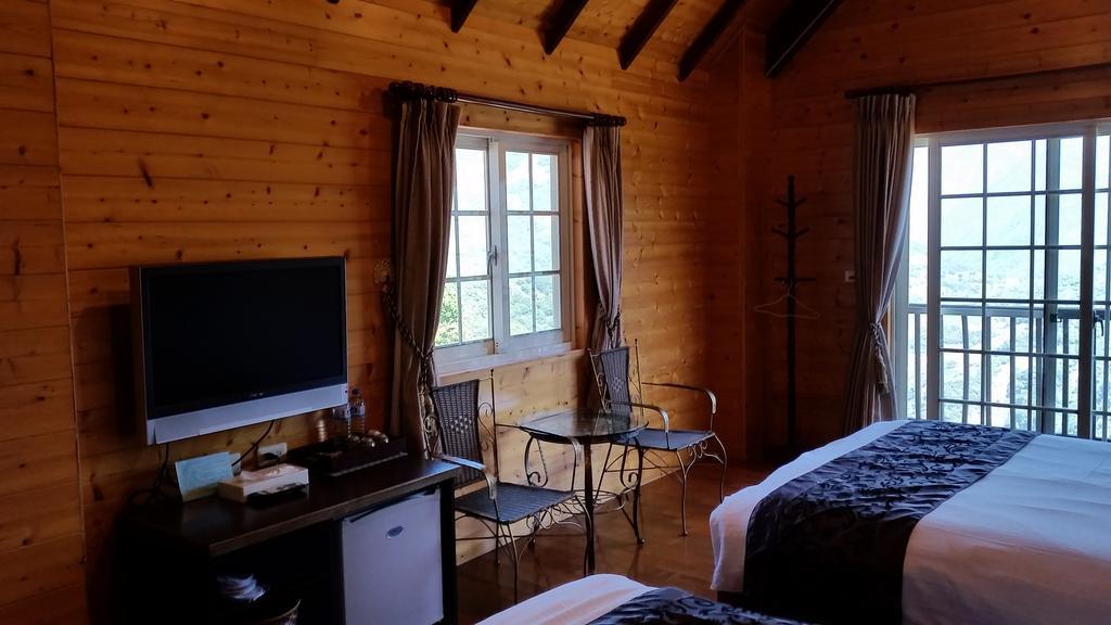 Qingjing Xiaozhu Apartman Zsenaj Szoba fotó
