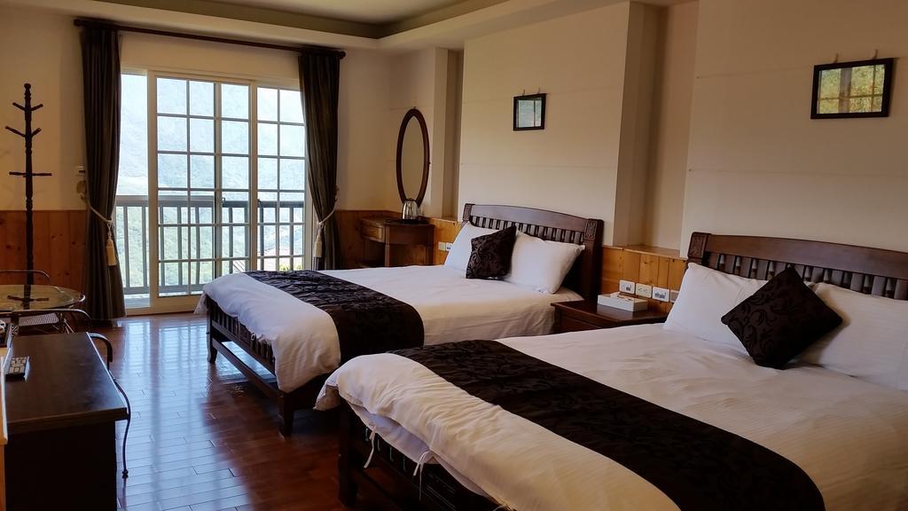 Qingjing Xiaozhu Apartman Zsenaj Szoba fotó